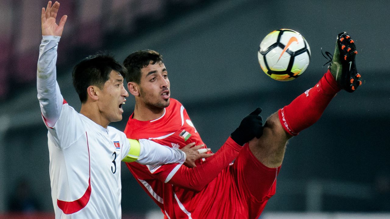 Oday Dabbagh, who plays club football in Portugal, is pictured playing for the
Palestinian national team against Song Kum Song of North Korea during the 2018 AFC Under-23
Championship in Jiangyin city, east China's Jiangsu province, in January 2018.