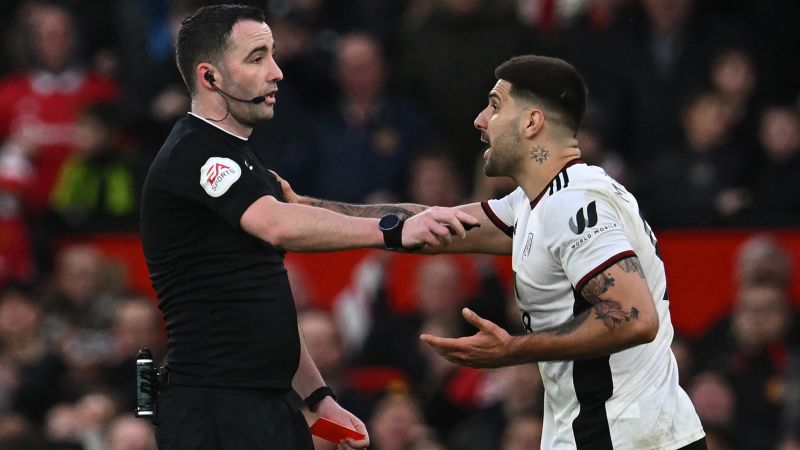 Referee pushed and Fulham shown three red cards during frenzied few minutes against Manchester United