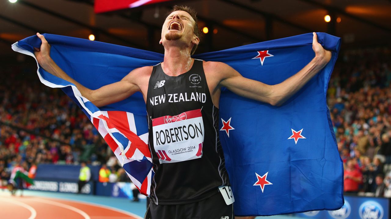 Robertson celebrates winning bronze in the 5,000 meters at the 2014 Commonwealth Games.