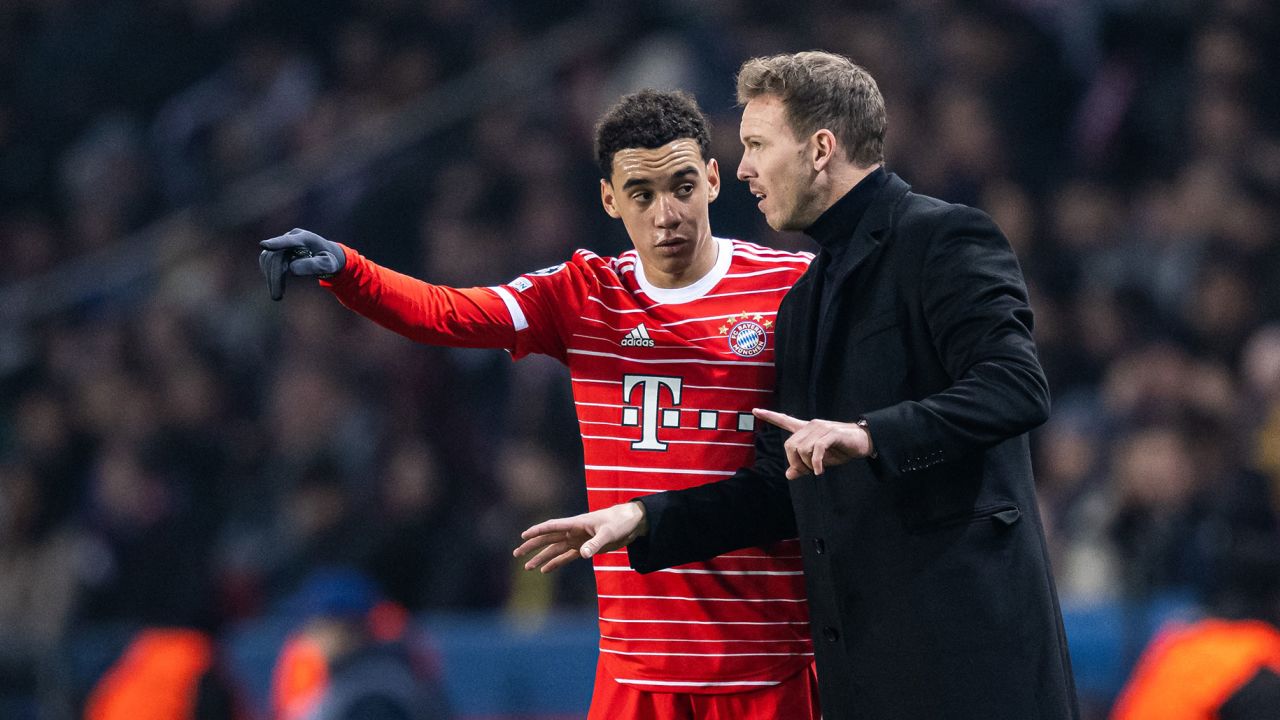 Julian Nagelsmann gives instructions to Bayern's Jamal Musiala against PSG.