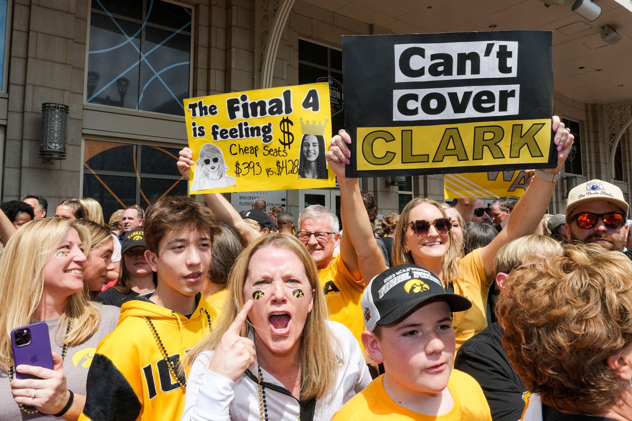 Iowa fans get ready for the game at the American Airlines Center.