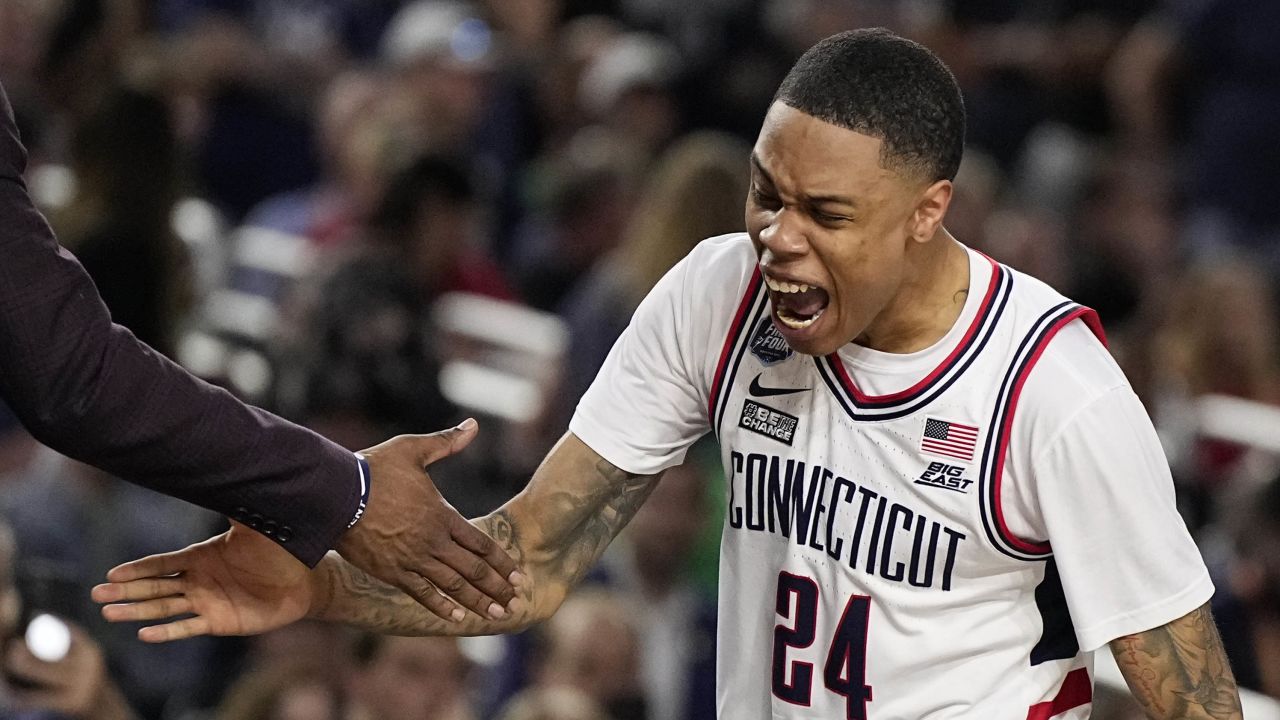 Hawkins celebrates during the second half of the men's national championship college basketball game against San Diego State.