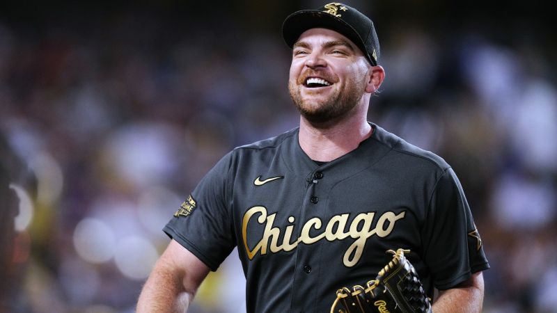 Chicago White Sox pitcher Liam Hendriks rings victory bell after finishing cancer treatments