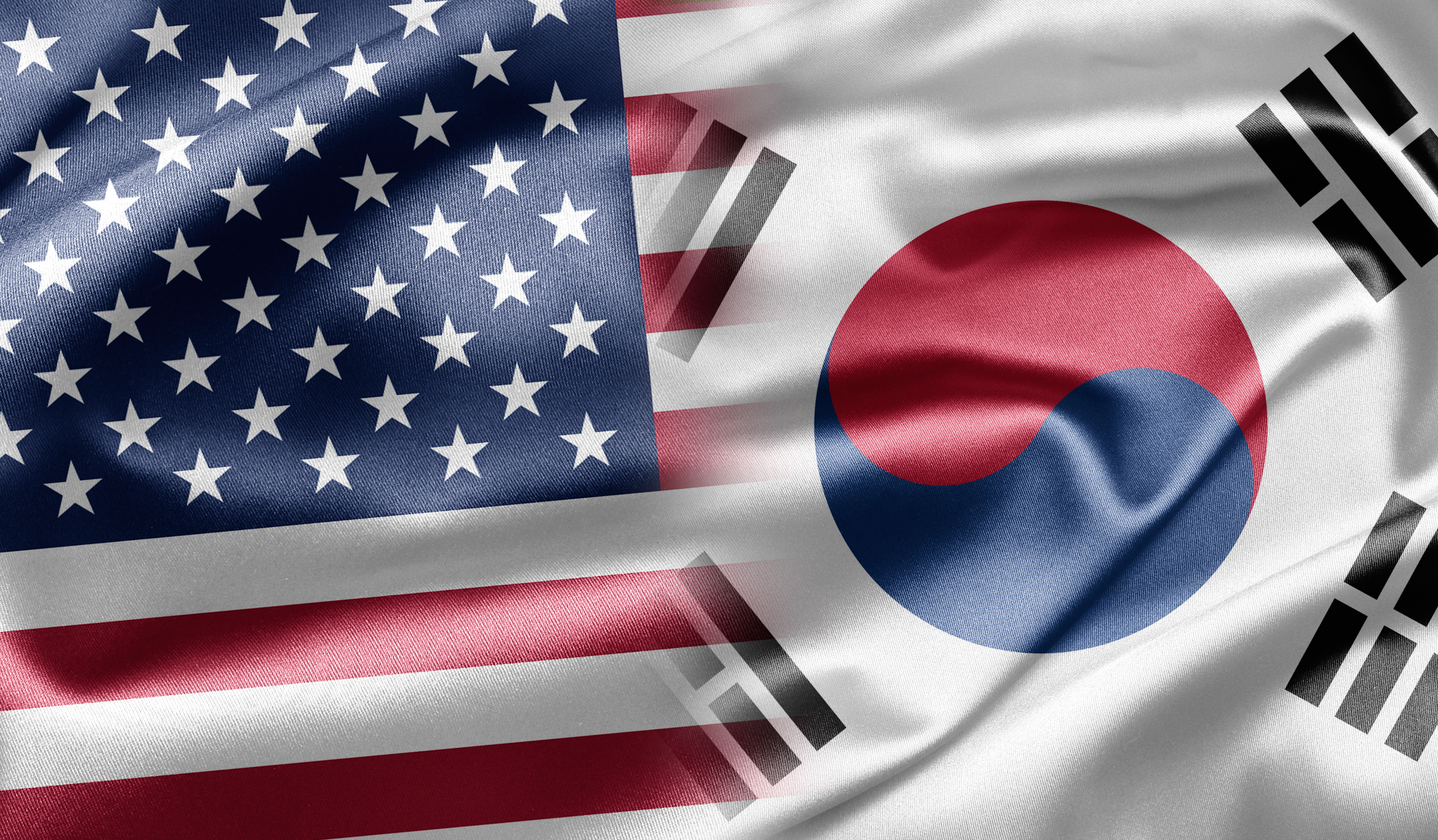 The flags of the USA and South Korea side by side.