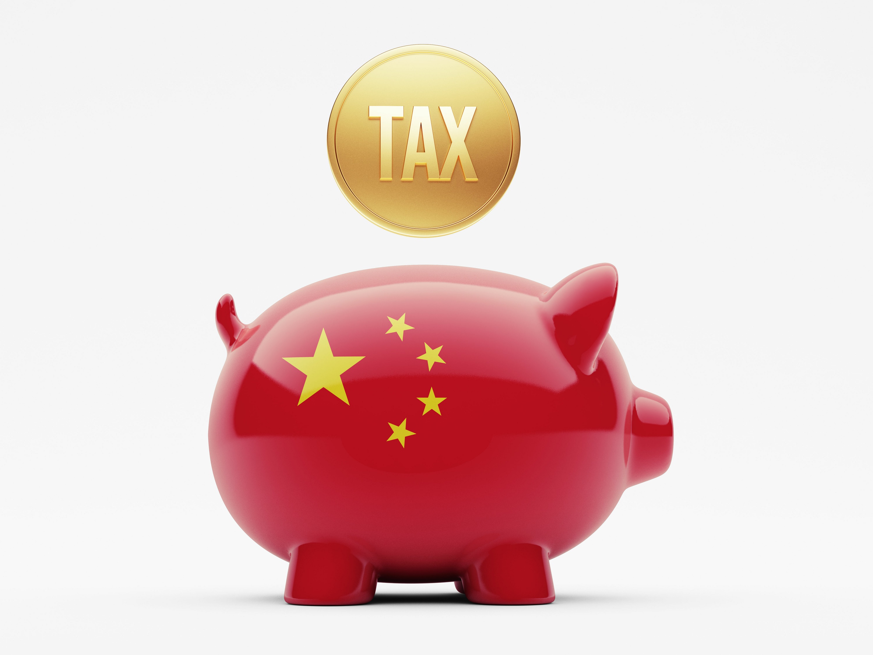 A golden coin with the word “tax” on it hangs above a piggy bank decorated in the colors of the Chinese flag.