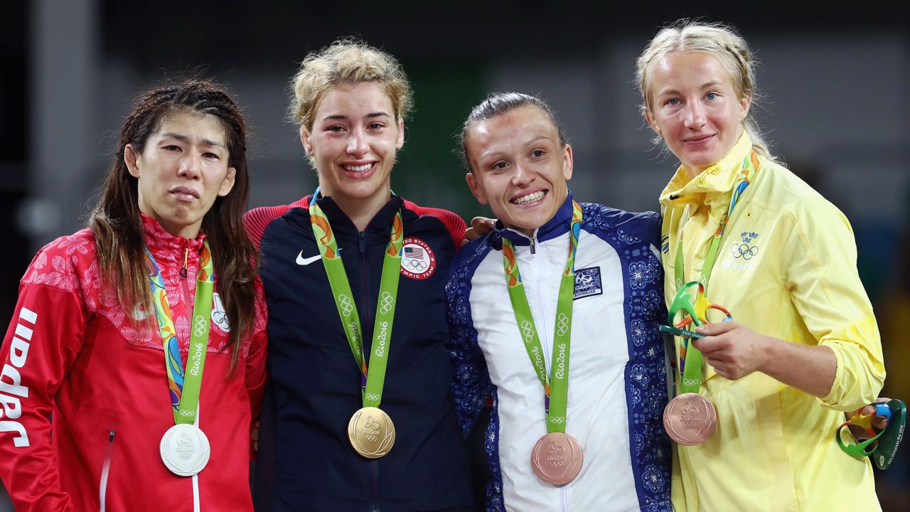 Maroulis, second left, won a gold medal at the Rio Olympics in 2016.