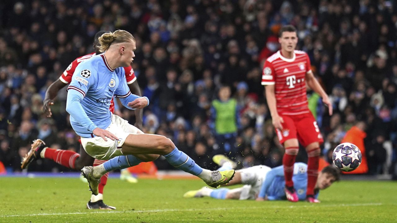 Haaland scores his side's third goal during the Champions League quarterfinal first-leg.