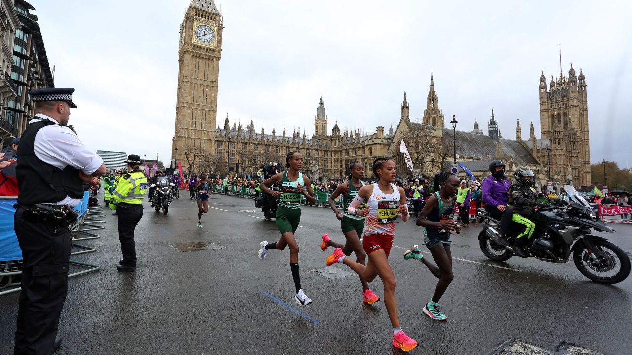 Hassan (center left) passes Big Ben on her way to an unexpected victory in London.