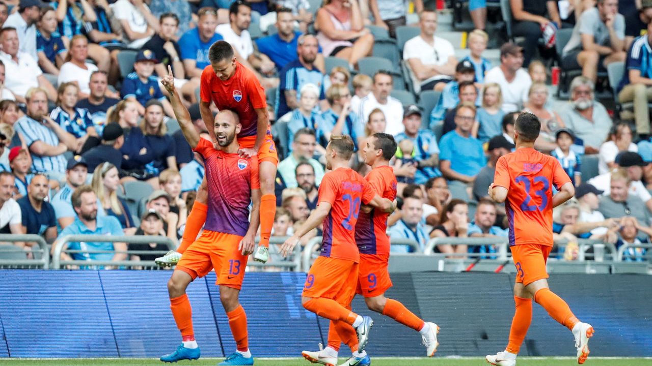 Mariupol's Sergiy Yavorsky celebrates with his teammates after scoring against Djurgardens IF in the UEFA Europa League second qualifying round in 2018.