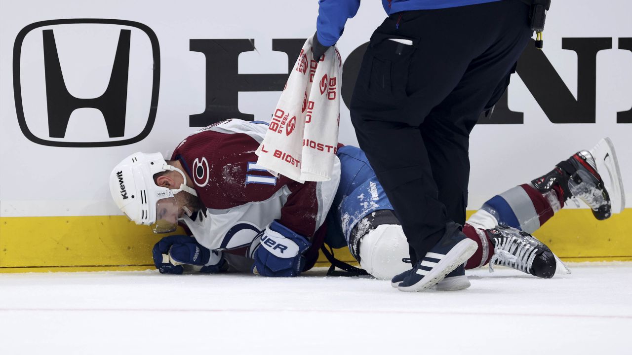 Cogliano is tended to by medical staff during Game 6 against the Seattle Kraken.