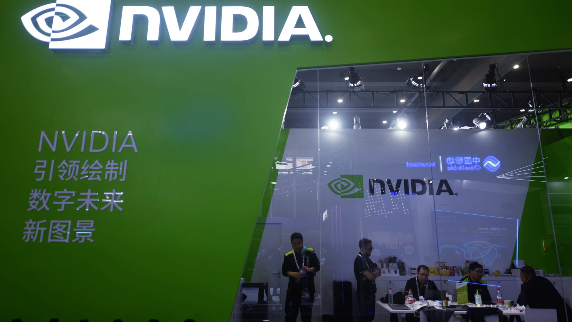 Stocks making the biggest moves midday: Nvidia, Tesla, Coinbase and more