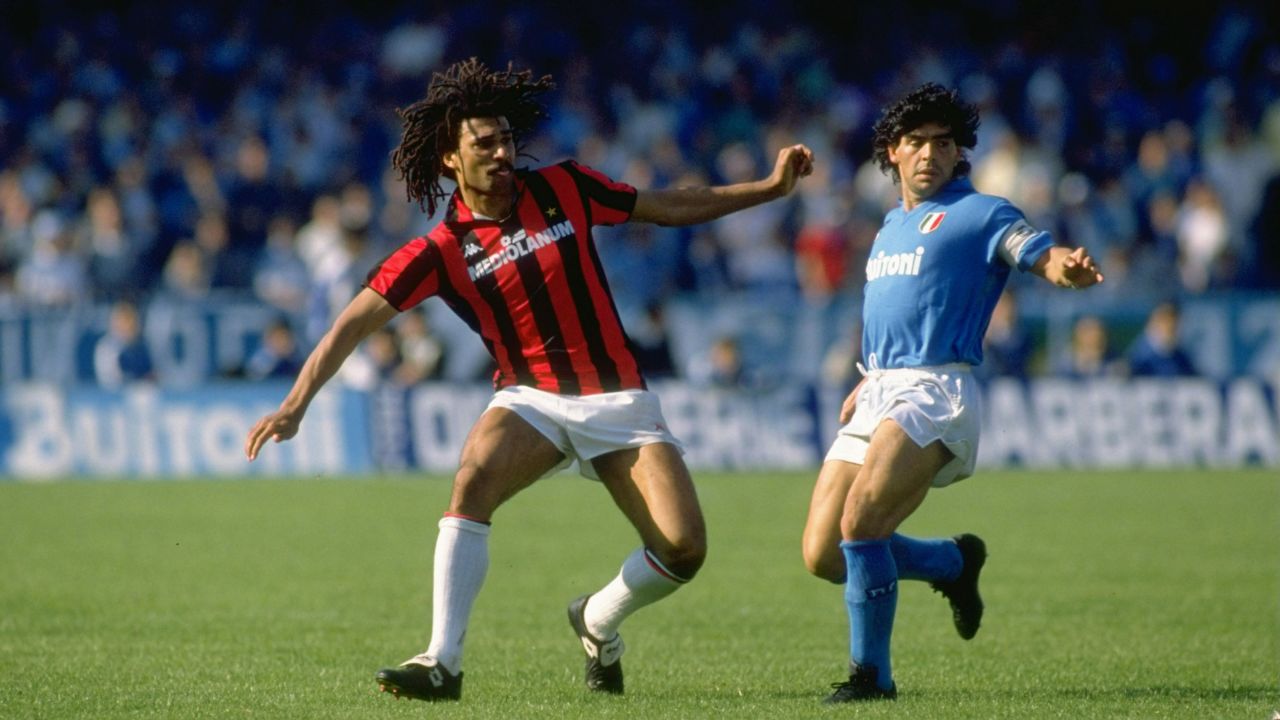 Diego Maradona battles dribbles against Ruud Gullit of AC Milan in the Serie A in 1988.