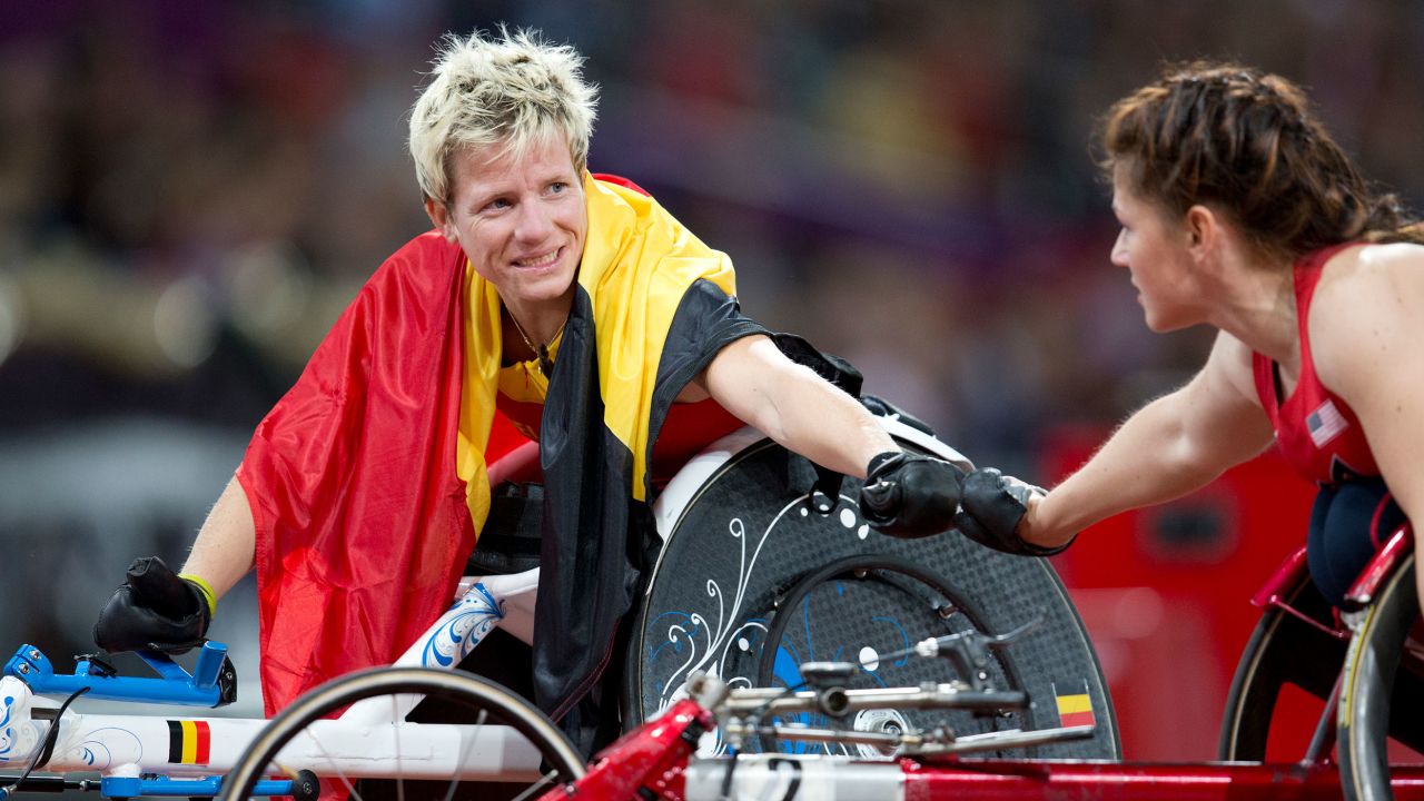 Vervoort fist bumps another competitor at the London 2012 Paralympics.