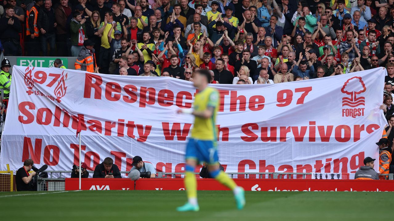 Nottingham Forest fans hold up a banner in memory of the 97 victims of the Hillsborough disaster.