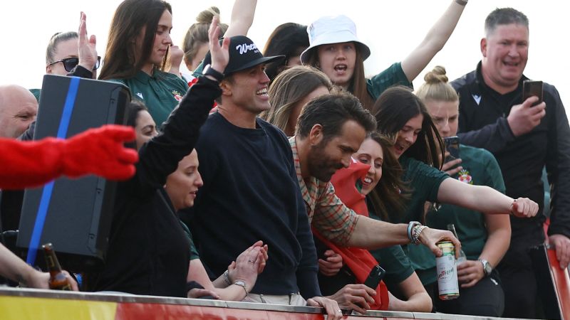 Ryan Reynolds and Rob McElhenney join Wrexham’s open-top bus parade