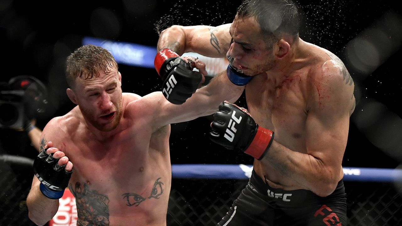 Gaethje (left) punches Tony Ferguson in their Interim lightweight title fight during UFC 249 on May 9, 2020.