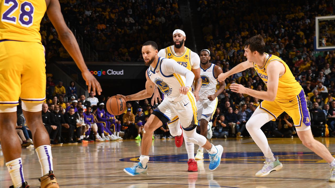 Curry dribbles the ball during Game 5