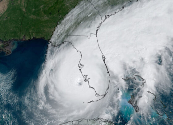 A satellite image of Hurricane Ian with its eye just west of Florida