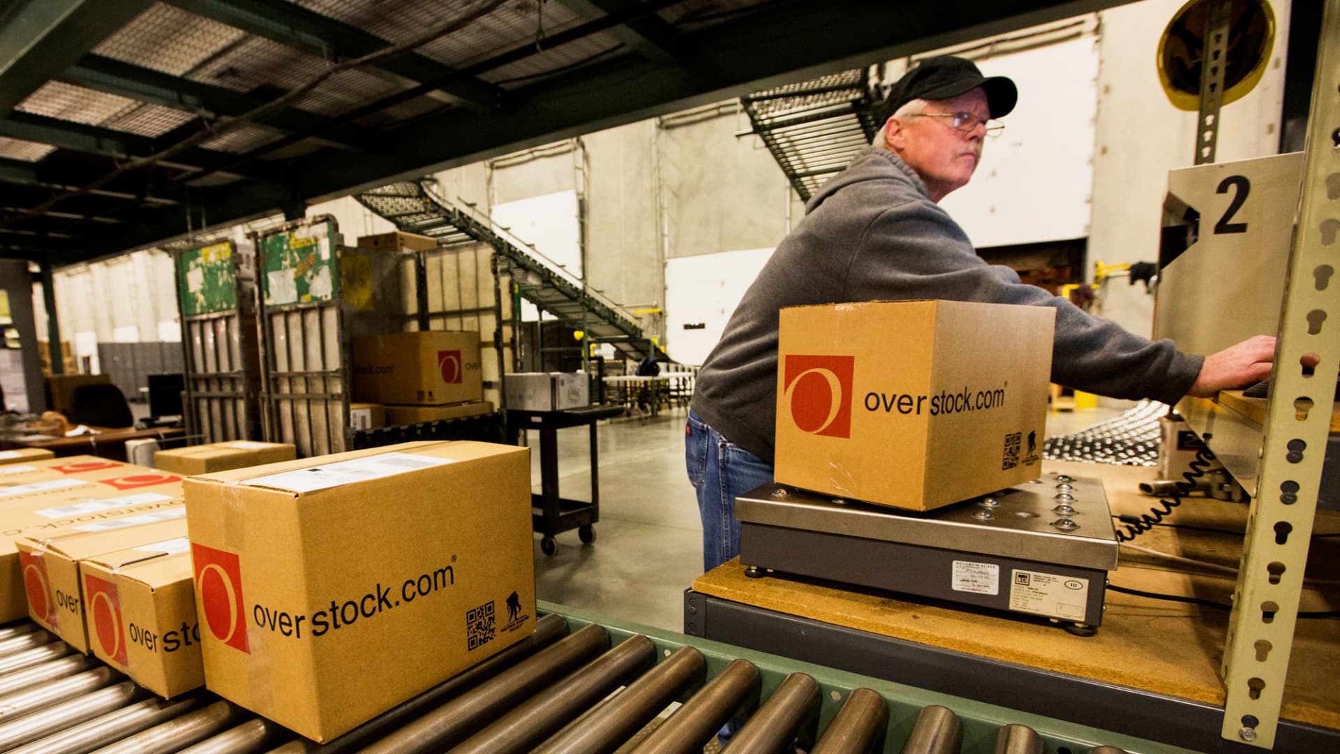 Stocks making the biggest moves midday: Overstock, Tesla, Accenture and more