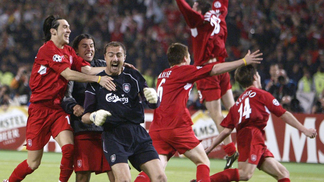 Jerzy Dudek is mobbed by Liverpool teammates after the penalty shootout.