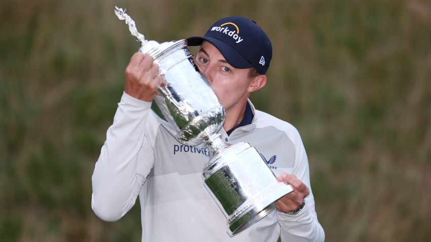 BROOKLINE, MASSACHUSETTS - JUNE 19: Matt Fitzpatrick of England kisses the U.S. Open Championship trophy after winning during the final round of the 122nd U.S. Open Championship at The Country Club on June 19, 2022 in Brookline, Massachusetts. (Photo by Warren Little/Getty Images)