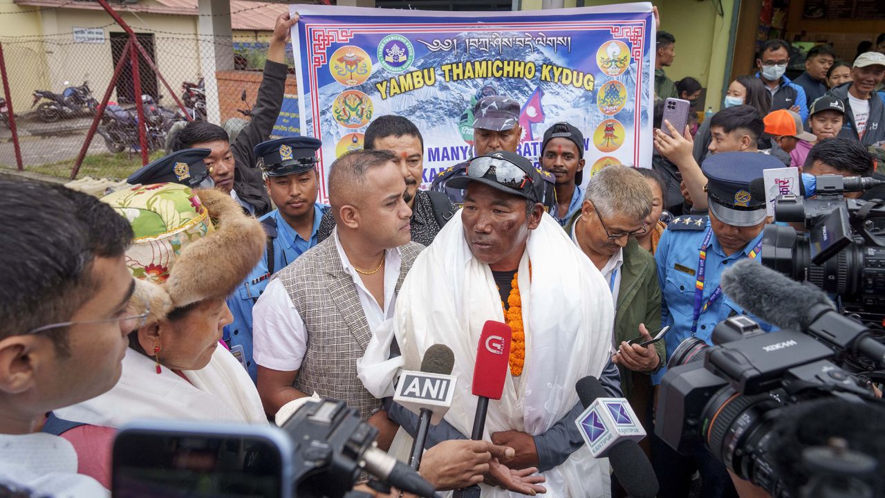 Kami Rita talks to the media at the airport in Kathmandu on May 25, 2023.