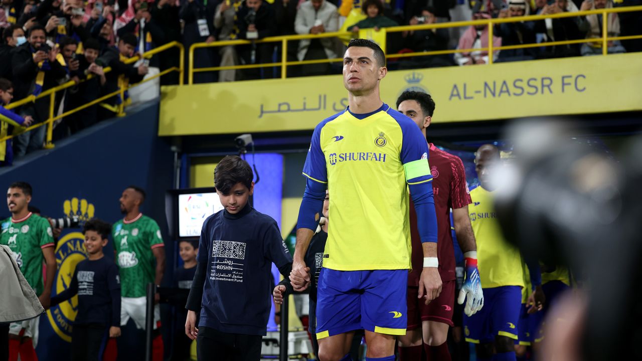 RIYADH, SAUDI ARABIA - JANUARY 22: Cristiano Ronaldo of Al Nassr leads the team out prior to the Saudi Pro League match between Al Nassr and Al-Ittifaq Club at Mrsool Park Stadium on January 22, 2023 in Riyadh, Saudi Arabia. (Photo by Yasser Bakhsh/Getty Images)