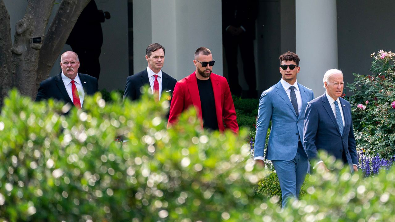 Biden, Mahomes, Kelce, Mark Donovan -- president of the Chiefs -- and Andy Reid - head coach of the Chiefs -- arrive for a ceremony on the South Lawn of the White House.