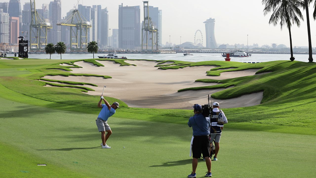 DeChambeau in action during day at LIV Golf Invitational - Singapore at Sentosa Golf Club in April.