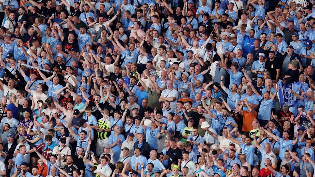 Soccer Football - Champions League Final - Manchester City v Inter Milan - Ataturk Olympic Stadium, Istanbul, Turkey - June 11, 2023
Manchester City fans celebrate after winning the Champions League final REUTERS/Umit Bektas