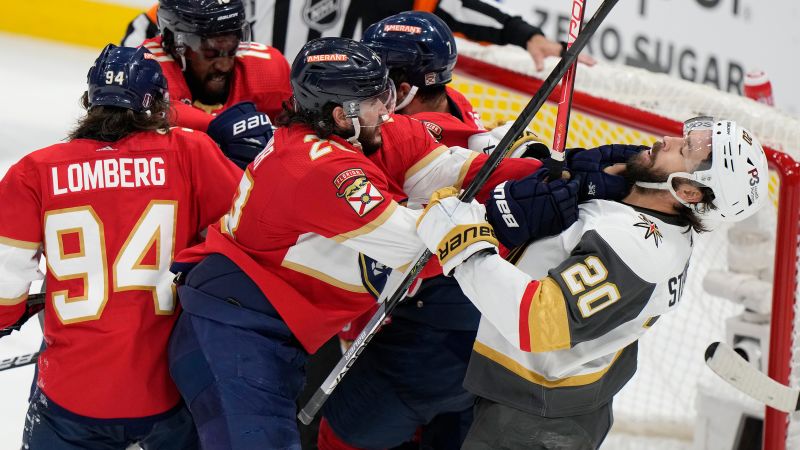 Players brawl and fans throw objects onto the ice in fiery end to Stanley Cup Game 4