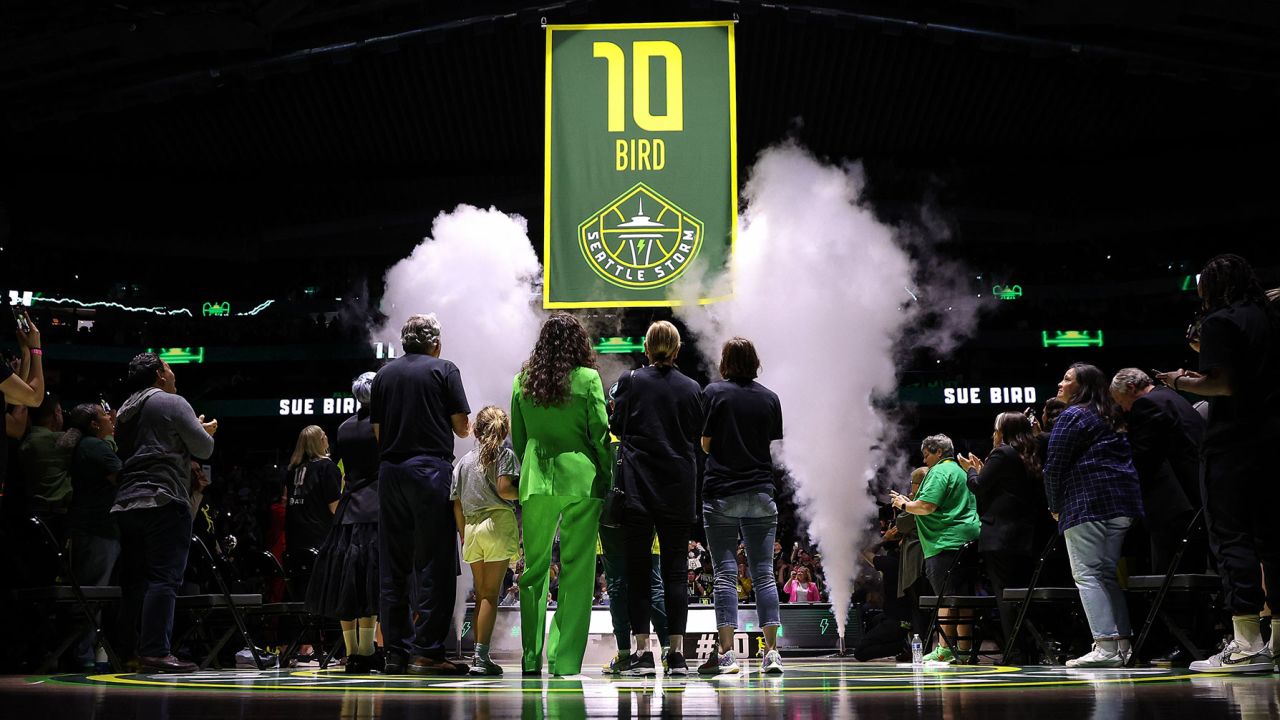 SEATTLE, WASHINGTON - JUNE 11: Sue Bird watches her jersey rise into the rafters during her jersey retirement ceremony after the game between the Seattle Storm and the Washington Mystics at Climate Pledge Arena on June 11, 2023 in Seattle, Washington.