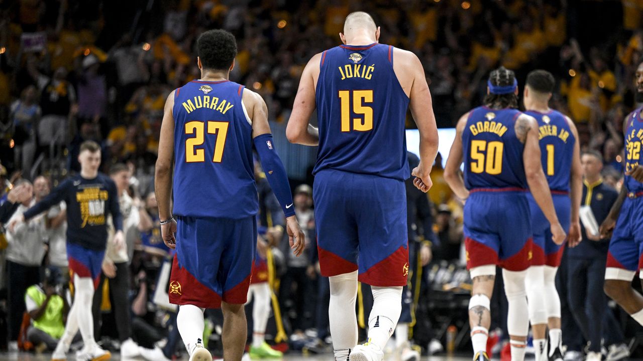 DENVER, CO - JUNE 1: Jamal Murray (27) of the Denver Nuggets and Nikola Jokic (15) take a timeout against the Miami Heat during the third quarter of the NBA Finals game 1 at Ball Arena in Denver on Thursday, June 1, 2023. (Photo by AAron Ontiveroz/The Denver Post)