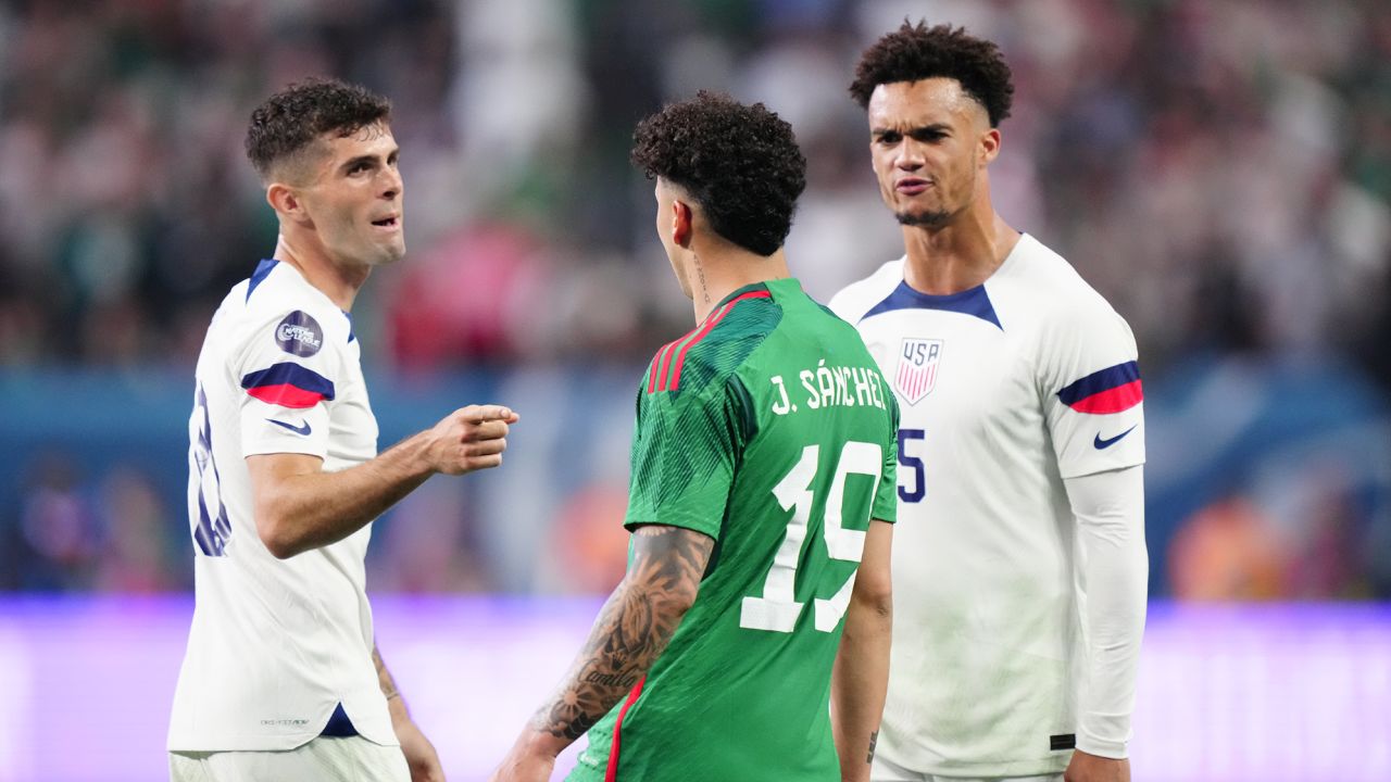 LAS VEGAS, NEVADA - JUNE 15: Christian Pulisic #10 and Antonee Robinson #5 gestures at Jorge Sanchez #19 of Mexico during the second half during the 2023 CONCACAF Nations League semifinals at Allegiant Stadium on June 15, 2023 in Las Vegas, Nevada. (Photo by Louis Grasse/Getty Images)