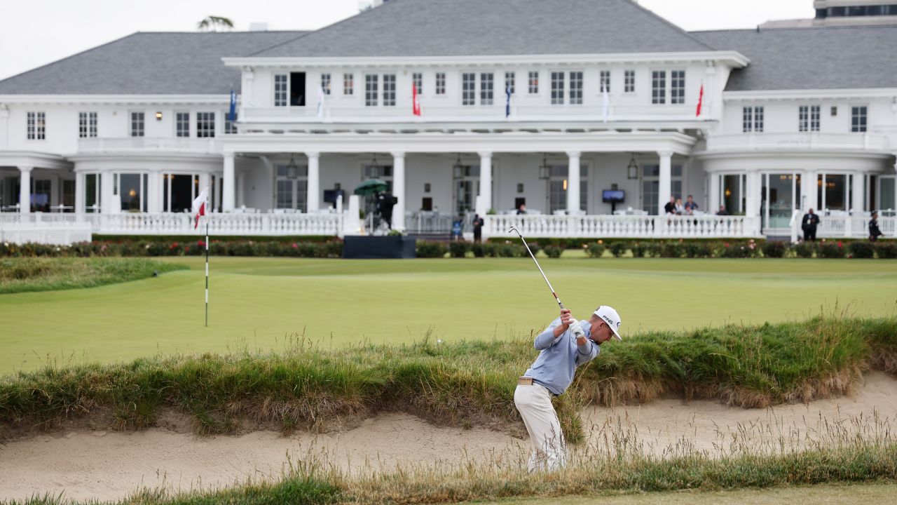 Sam Bennett of the United States plays a shot from a bunker on the 18th hole  during the first round of the 123rd U.S. Open Championship at The Los Angeles Country Club on June 15, 2023 in Los Angeles, California.