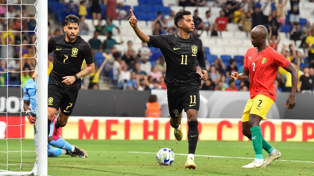 Brazil's forward Rodrygo (C) celebrates after scoring his team's second goal during the international friendly football match between Brazil and Guinea at the RCDE Stadium in Cornella de Llobregat near Barcelona on June 17, 2023.