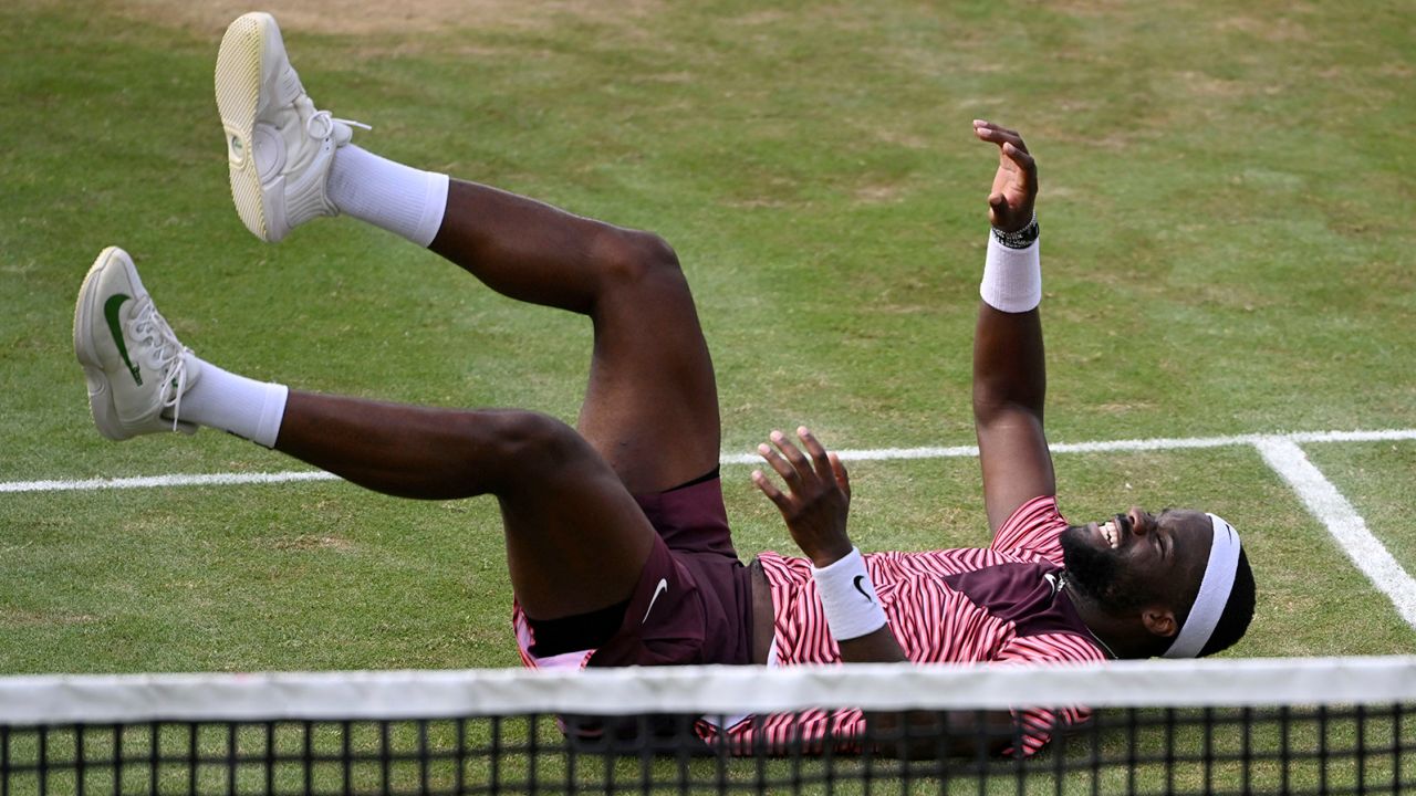 United States' Frances Tiafoe celebrates after winning the final match of the Stuttgart Open against Germany's Jan-Lennard Struff, in Stuttgart, Germany, Sunday, June 18, 2023.