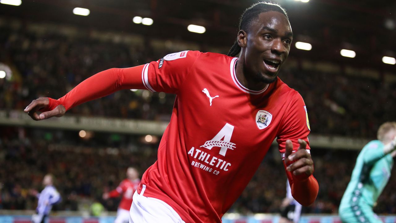 BARNSLEY, ENGLAND - MARCH 21: Devante Cole of Barnsley celebrates after scoring the team's first goal during the Sky Bet League One between Barnsley and Sheffield Wednesday at Oakwell Stadium on March 21, 2023 in Barnsley, England. (Photo by George Wood/Getty Images)