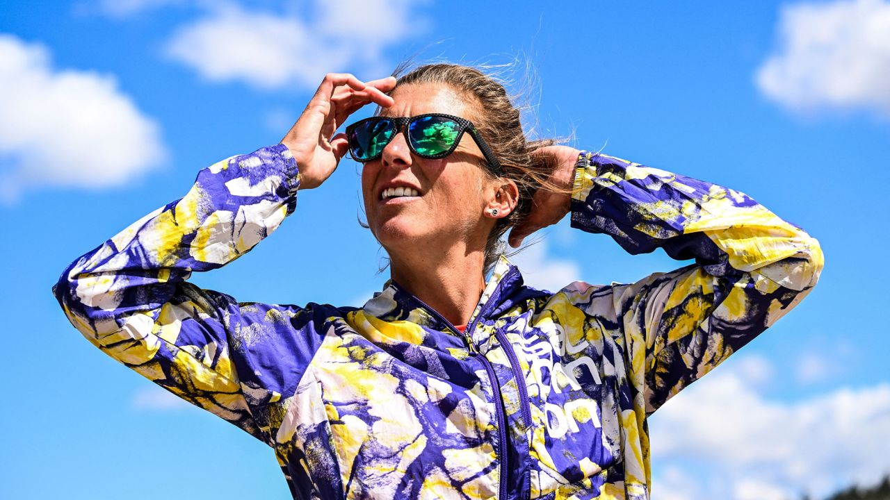 US ultramarathon runner Courtney Dauwalter poses during her morning fitness run near Twin Lakes, Colorado, on May 16, 2023. Dauwalter sits at the apex of an elite group of ultra runners -- people who run 50, 100 or 200 miles (322 kilometers) in one go. Wearing over-sized shorts and a huge smile, she burst onto the scene around a decade ago, and was soon leaving competitors -- including men -- for dust, knocking hours off course records. (Photo by CHANDAN KHANNA / AFP) (Photo by CHANDAN KHANNA/AFP via Getty Images)