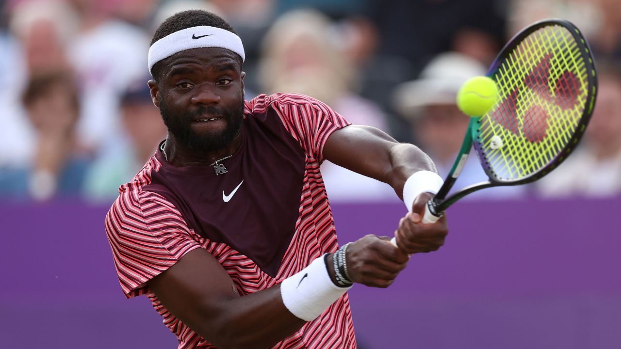 LONDON, ENGLAND - JUNE 21: Frances Tiafoe of United States plays a backhand against Sebastian Korda of United States during the Men's Singles Second Round match on Day Three of the cinch Championships at The Queen's Club on June 21, 2023 in London, England.