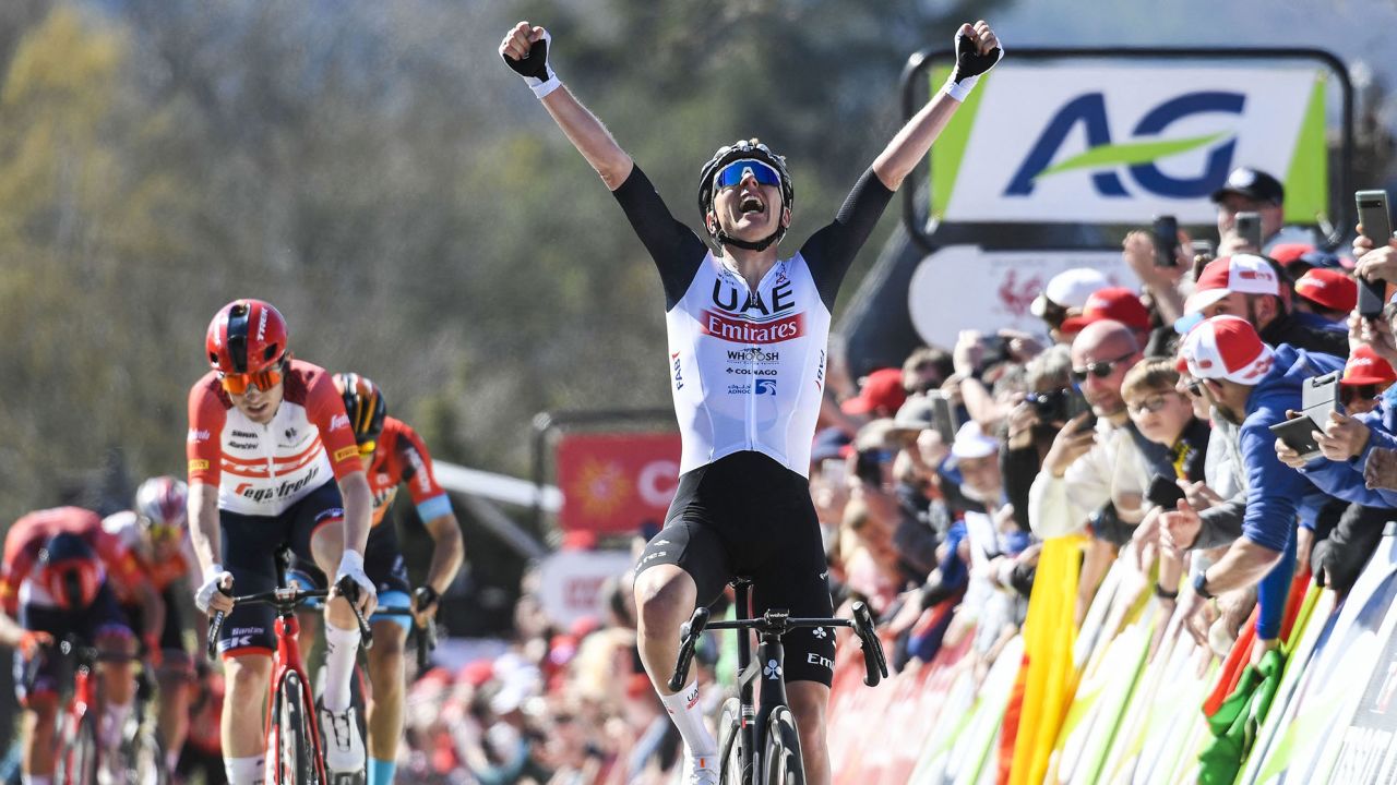 Slovenian Tadej Pogacar of UAE Team Emirates celebrates as he crosses the finish line to win the 86th edition of the men's race "La Fleche Wallonne", a one day cycling race (Waalse Pijl - Walloon Arrow), 194,2 km from Herve to Huy, in Belgium, on April 19, 2023 (Photo by GOYVAERTS / BELGA / AFP) / Belgium OUT (Photo by GOYVAERTS/BELGA/AFP via Getty Images)