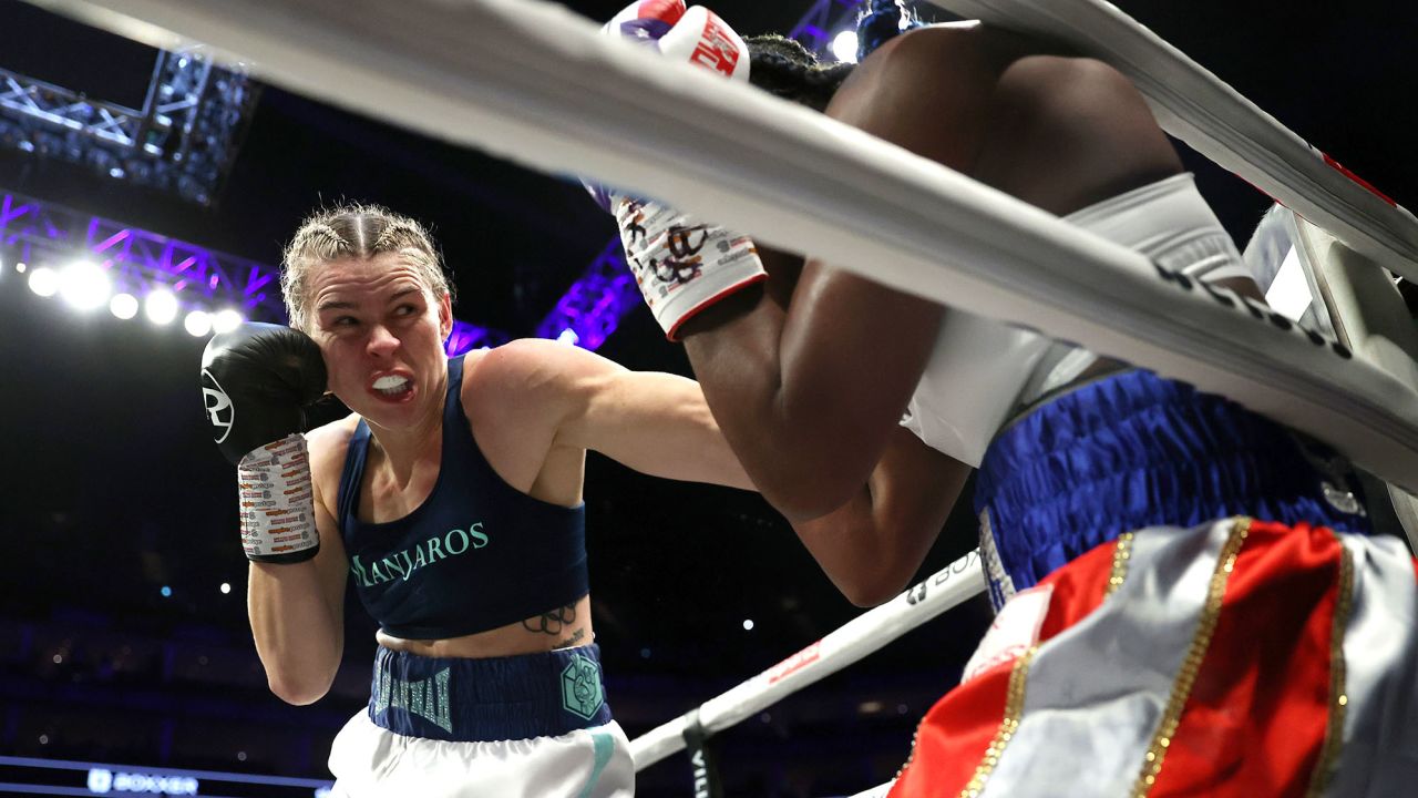 LONDON, ENGLAND - OCTOBER 15: Savannah Marshall (L) punches Claressa Shields (R) during the IBF, WBA, WBC, WBO World Middleweight Title fight between Claressa Shields and Savannah Marshall on the Shields vs Marshall Boxxer fight night which is the first women's only boxing card in the UK at The O2 Arena on October 15, 2022 in London, England. (Photo by James Chance/Getty Images)