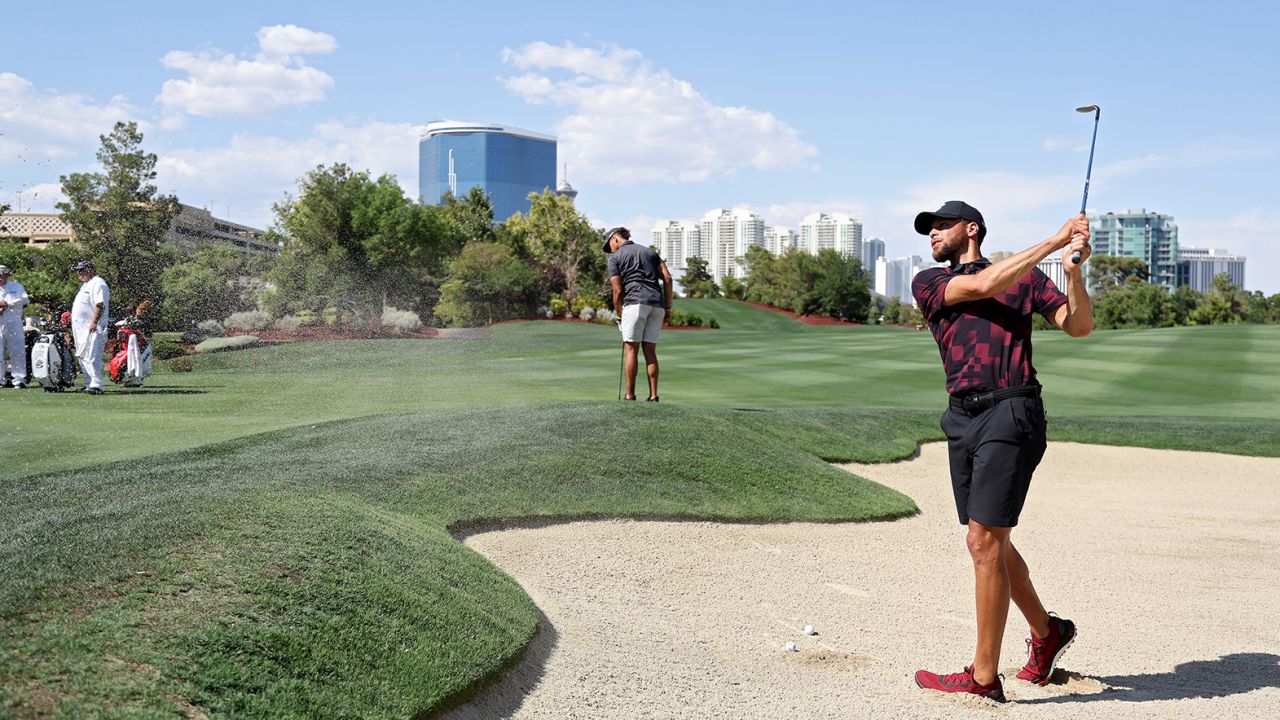 Steph Curry plays shots from the practice range prior to Capital One's The Match VIII - Curry & Thompson vs. Mahomes & Kelce at Wynn Golf Club on June 29, 2023 in Las Vegas, Nevada.