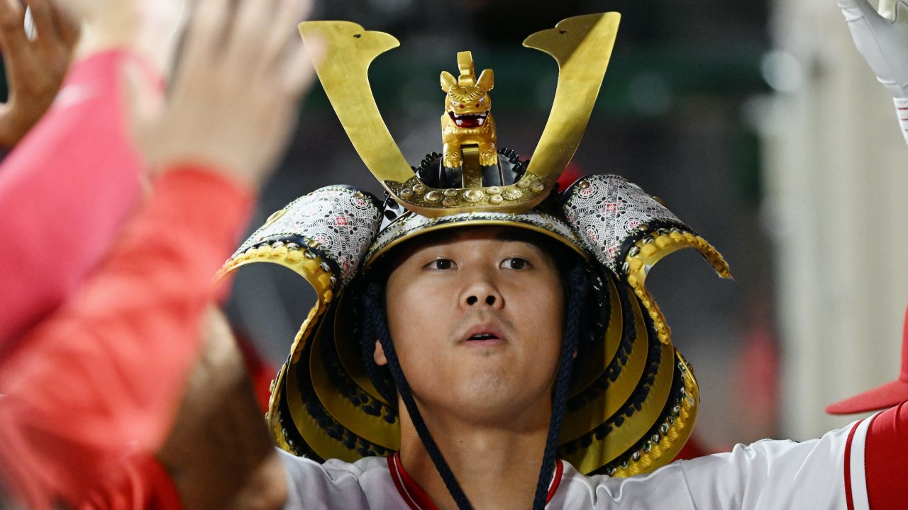 ANAHEIM, CA - JUNE 30: Los Angeles Angels designated hitter Shohei Ohtani (17) wearing a kabuto in the dugout after hitting a solo home run in the sixth inning of an MLB baseball game against the Arizona Diamondbacks played on June 30, 2023 at Angel Stadium in Anaheim, CA. (Photo by John Cordes/Icon Sportswire)