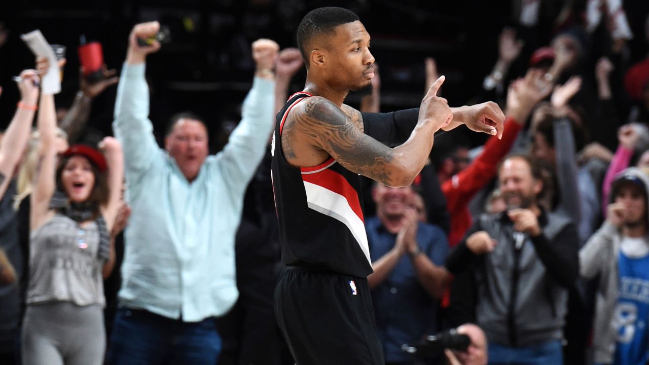 Portland Trail Blazers guard Damian Lillard reacts after hitting a shot in the final seconds of an NBA basketball game against the Los Angeles Lakers in Portland, Ore., Thursday, Nov. 2, 2017. The Blazers won 113-110.