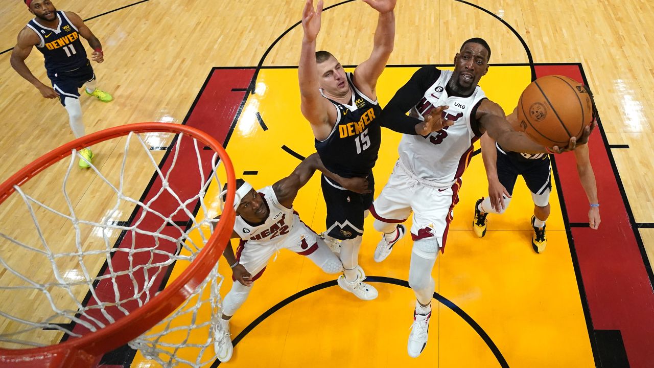 Bam Adebayo #13 of the Miami Heat shoots in the second half against Nikola Jokic #15 of the Denver Nuggets in Game Four of the 2023 NBA Finals at Kaseya Center on June 09, 2023 in Miami, Florida.