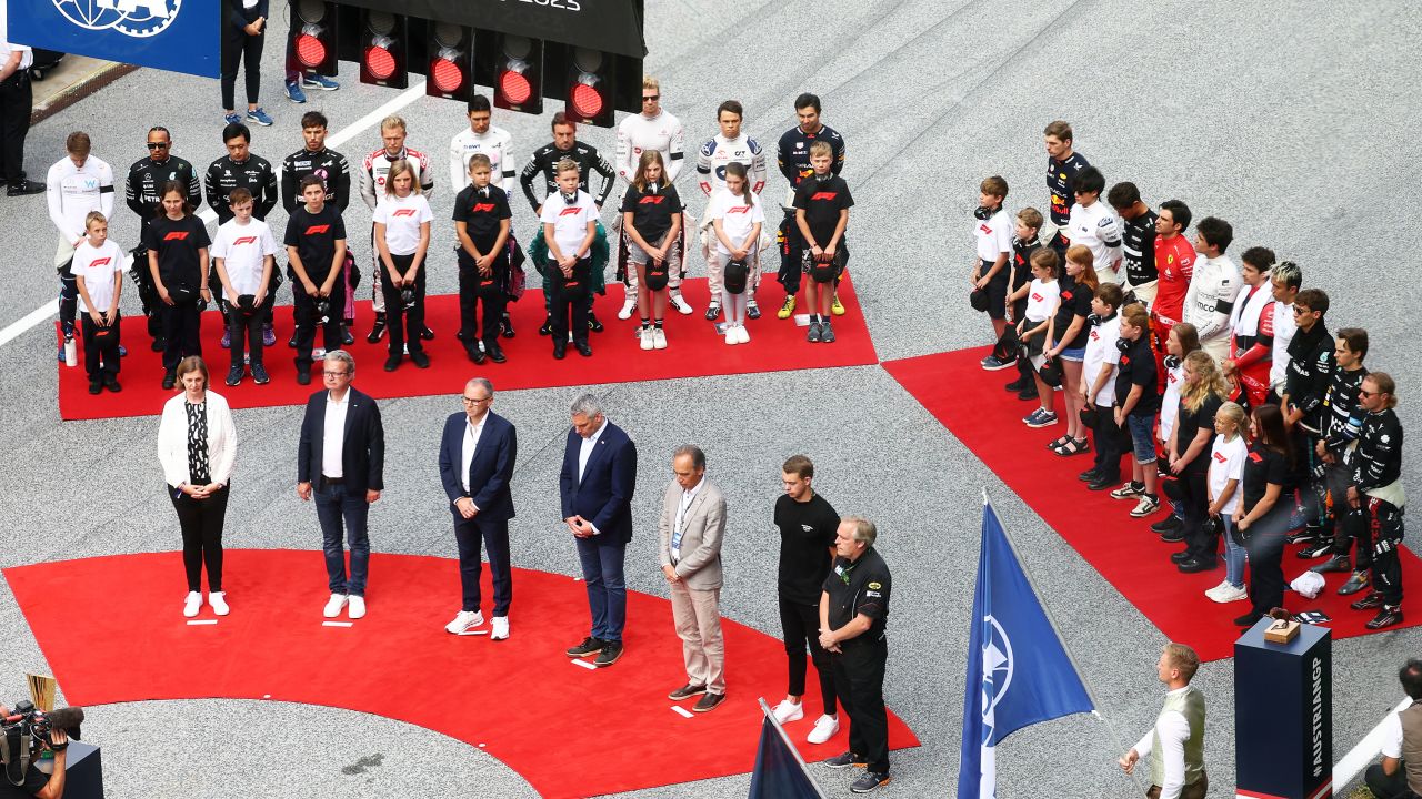 The F1 drivers stand on the grid for a minutes silence  to commemorate the passing of Dilano van't Hoff of Netherlands and MP Motorsport in the Formula Regional European Championship by Alpine event at Spa-Francorchamp prior to the F1 Grand Prix of Austria at Red Bull Ring on July 02, 2023 in Spielberg, Austria.