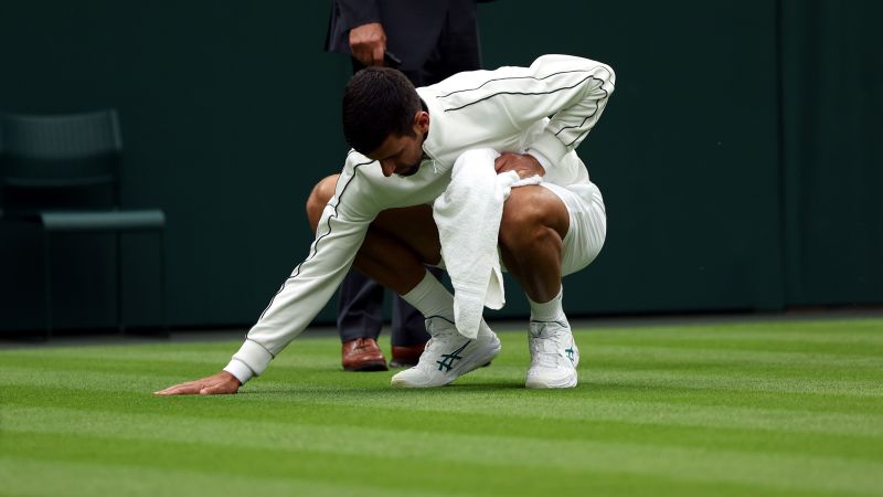 Novak Djokovic takes on grass-drying duties during first-round victory at Wimbledon