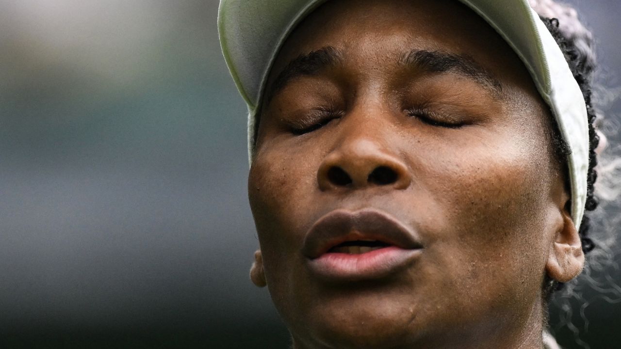 US player Venus Williams reacts as she plays against Ukraine's Elina Svitolina during their women's singles tennis match on the first day of the 2023 Wimbledon Championships at The All England Tennis Club in Wimbledon, southwest London, on July 3, 2023. (Photo by Daniel LEAL / AFP) / RESTRICTED TO EDITORIAL USE (Photo by DANIEL LEAL/AFP via Getty Images)