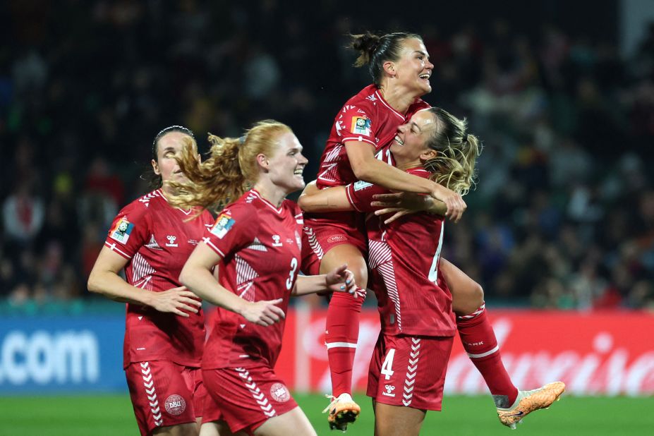 Danish players celebrate Amalie Vangsgaard's late goal that gave them a 1-0 victory over China on Saturday, July 22.